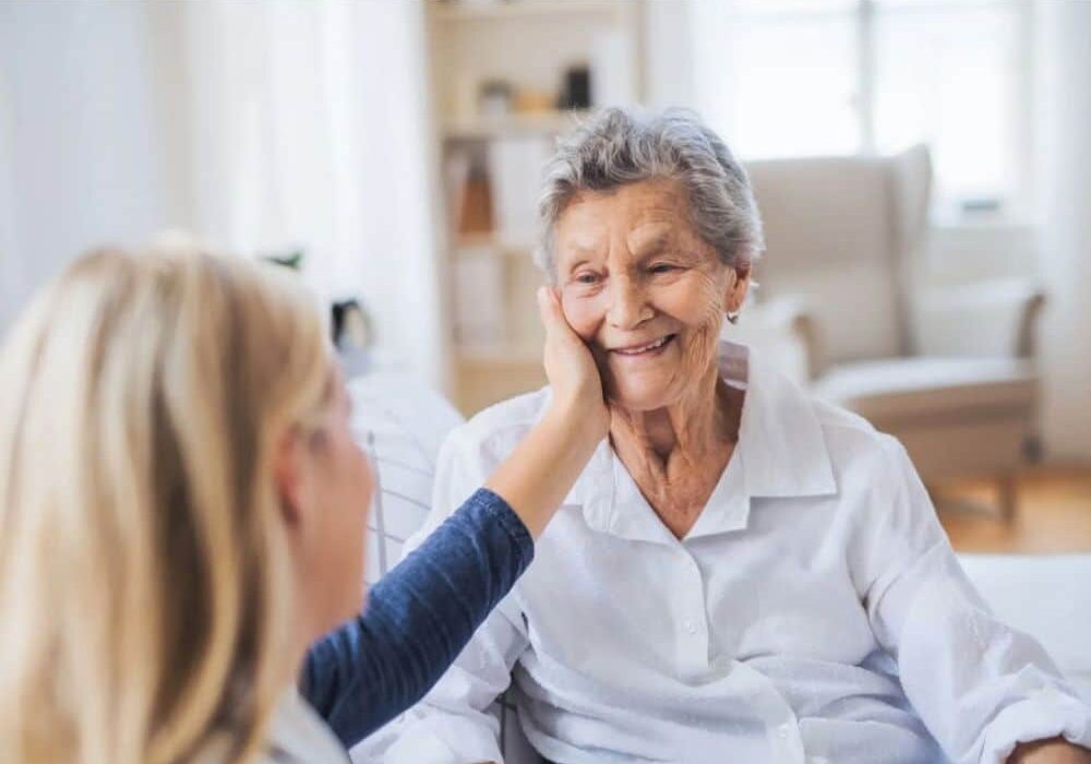 Caregiver connecting with an older adult client